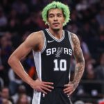 Dec 25, 2024; New York, New York, USA; San Antonio Spurs forward Jeremy Sochan (10) takes his position during a free throw attempt in the first quarter against the New York Knicks at Madison Square Garden. Mandatory Credit: Wendell Cruz-Imagn Images | Wendell Cruz-Imagn Images