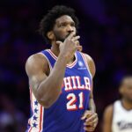 Jan 29, 2026; Philadelphia, Pennsylvania, USA; Philadelphia 76ers center Joel Embiid (21) reacts to his three pointer against the Sacramento Kings during the second quarter at Xfinity Mobile Arena. Mandatory Credit: Bill Streicher-Imagn Images