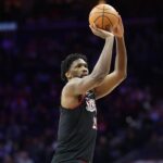 Jan 31, 2026; Philadelphia, Pennsylvania, USA; Philadelphia 76ers center Joel Embiid (21) shoots the ball against the New Orleans Pelicans during the fourth quarter at Xfinity Mobile Arena. Mandatory Credit: Bill Streicher-Imagn Images