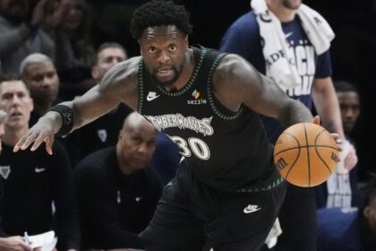 Feb 8, 2026; Minneapolis, Minnesota, USA; Minnesota Timberwolves forward Julius Randle (30) brings the ball up court against the Los Angeles Clippers in the first quarter at Target Center. Mandatory Credit: Bruce Kluckhohn-Imagn Images