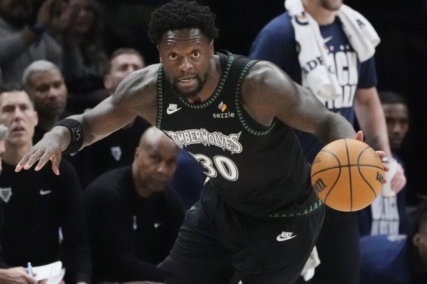 Feb 8, 2026; Minneapolis, Minnesota, USA; Minnesota Timberwolves forward Julius Randle (30) brings the ball up court against the Los Angeles Clippers in the first quarter at Target Center. Mandatory Credit: Bruce Kluckhohn-Imagn Images
