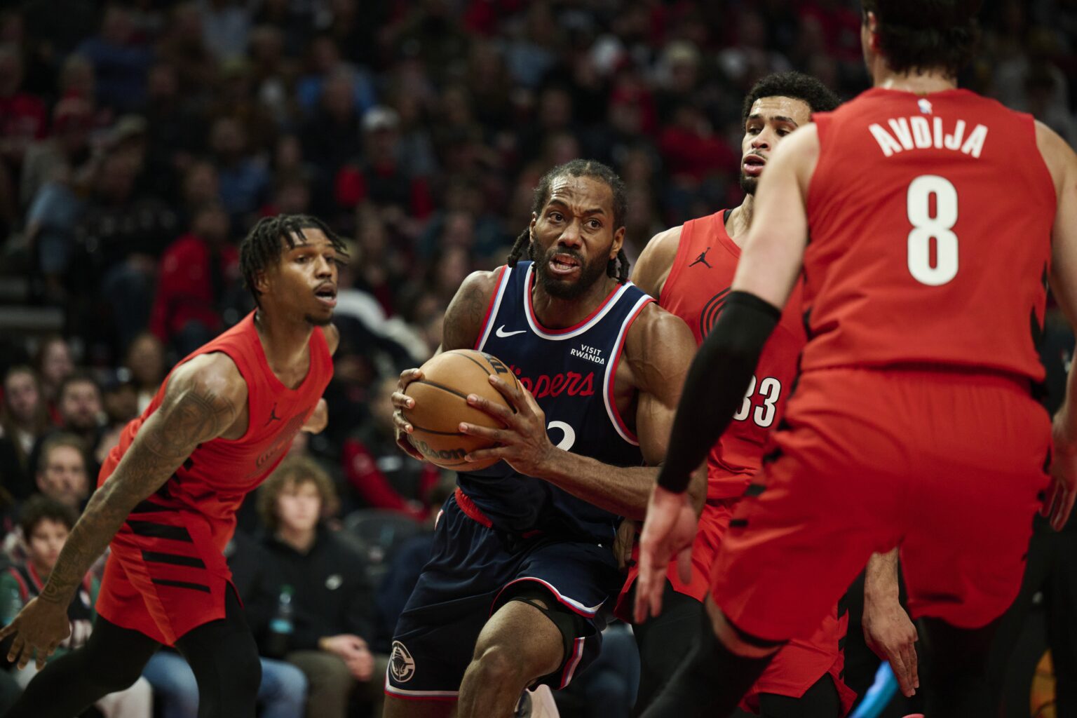 Dec 26, 2025; Portland, Oregon, USA; LA Clippers forward Kawhi Leonard (2) drives to the basket during the first half against Portland Trail Blazers forward Toumani Camara (33) at Moda Center. Mandatory Credit: Troy Wayrynen-Imagn Images