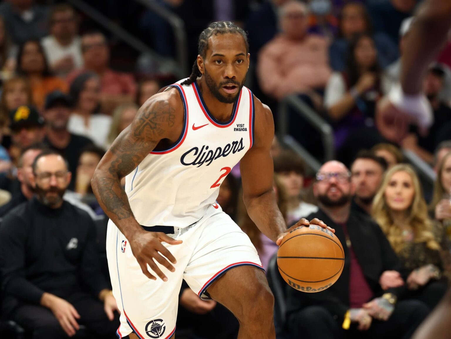 Feb 1, 2026; Phoenix, Arizona, USA; Los Angeles Clippers forward Kawhi Leonard (2) against the Phoenix Suns in the first half at Mortgage Matchup Center. Mandatory Credit: Mark J. Rebilas-Imagn Images