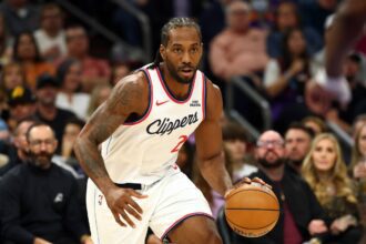 Feb 1, 2026; Phoenix, Arizona, USA; Los Angeles Clippers forward Kawhi Leonard (2) against the Phoenix Suns in the first half at Mortgage Matchup Center. Mandatory Credit: Mark J. Rebilas-Imagn Images