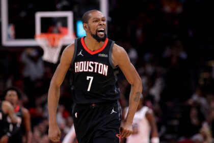 Houston Rockets forward Kevin Durant (7) reacts after a made basket against the Memphis Grizzlies during the fourth quarter at Toyota Center.