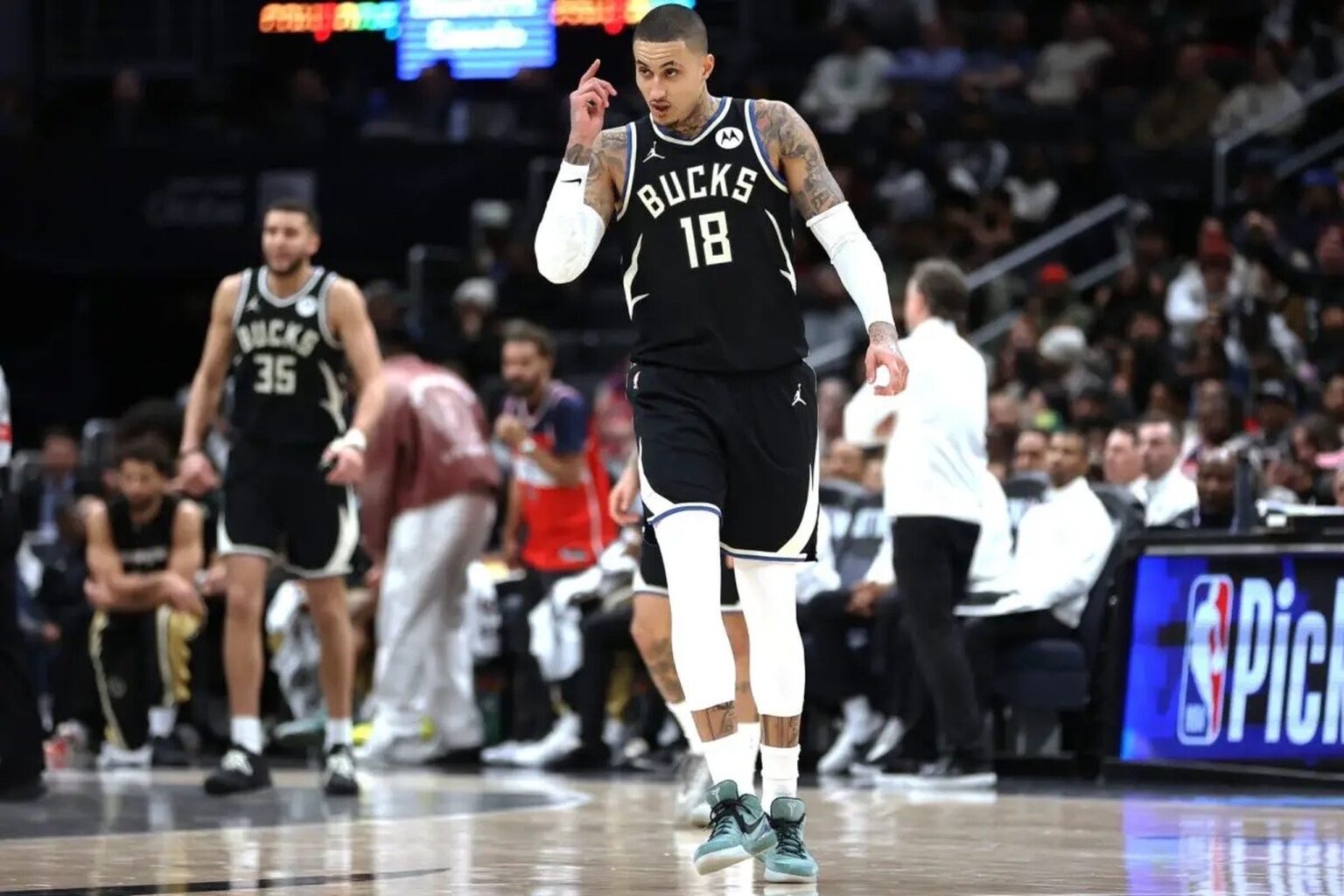 Jan 29, 2026; Washington, District of Columbia, USA; Milwaukee Bucks forward Kyle Kuzma (18) celebrates during the second half against the Washington Wizards at Capital One Arena. Mandatory Credit: Daniel Kucin Jr.-Imagn Images