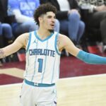 Jan 5, 2025; Cleveland, Ohio, USA; Charlotte Hornets guard LaMelo Ball (1) reacts in the fourth quarter against the Cleveland Cavaliers at Rocket Mortgage FieldHouse. Mandatory Credit: David Richard-Imagn Images