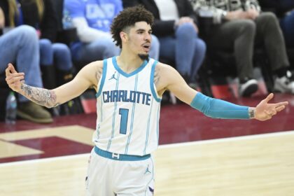 Jan 5, 2025; Cleveland, Ohio, USA; Charlotte Hornets guard LaMelo Ball (1) reacts in the fourth quarter against the Cleveland Cavaliers at Rocket Mortgage FieldHouse. Mandatory Credit: David Richard-Imagn Images