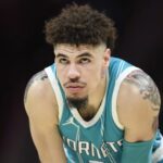 LaMelo Ball looks on during a Charlotte Hornets game. Mandatory Credit: Sam Sharpe - Imagn Images