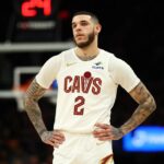 Jan 30, 2026; Phoenix, Arizona, USA; Cleveland Cavaliers guard Lonzo Ball (2) against the Phoenix Suns at Mortgage Matchup Center. Mandatory Credit: Mark J. Rebilas-Imagn Images