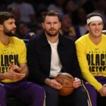 Feb 9, 2026; Los Angeles, California, USA; Los Angeles Lakers guard Luka Doncic (middle) watches a game against the Oklahoma City Thunder at Crypto.com Arena. Mandatory Credit: Kiyoshi Mio-Imagn Images