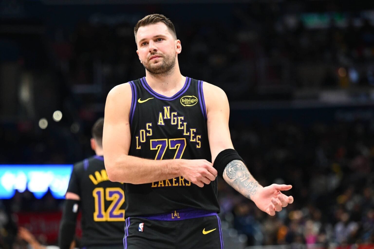 Jan 30, 2026; Washington, District of Columbia, USA; Los Angeles Lakers forward/guard Luka Doncic (77) on the court against the Washington Wizards during the first half at Capital One Arena. Mandatory Credit: Brad Mills-Imagn Images