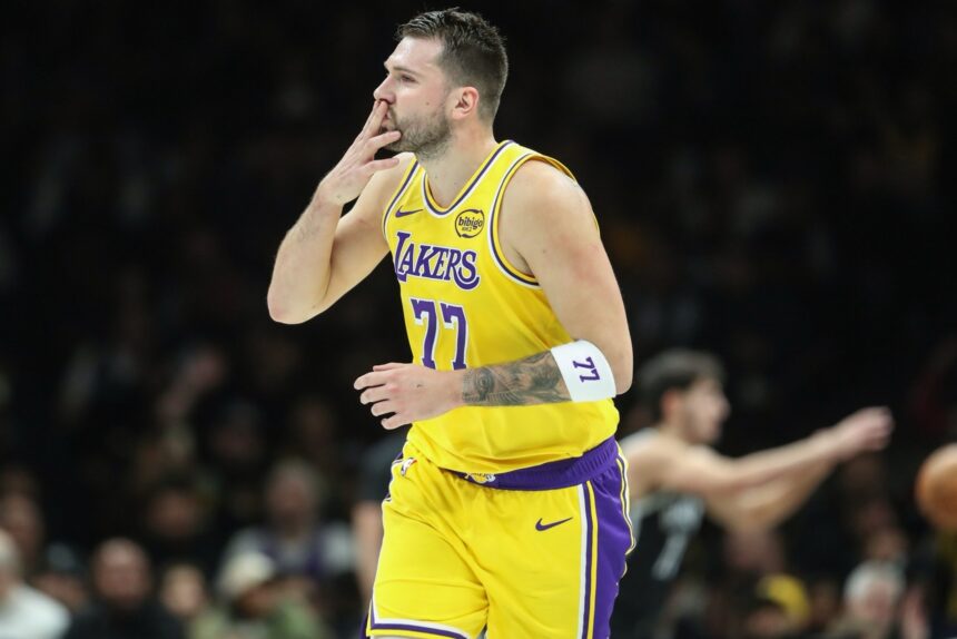 Feb 3, 2026; Brooklyn, New York, USA; Los Angeles Lakers guard Luka Doncic (77) gestures after scoring in the first quarter against the Brooklyn Nets at Barclays Center. Mandatory Credit: Wendell Cruz-Imagn Images