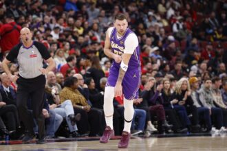 Jan 26, 2026; Chicago, Illinois, USA; Los Angeles Lakers guard Luka Doncic (77) reacts after scoring against the Chicago Bulls during the first half at United Center. Mandatory Credit: Kamil Krzaczynski-Imagn Images