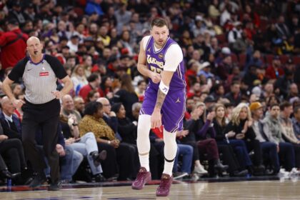Jan 26, 2026; Chicago, Illinois, USA; Los Angeles Lakers guard Luka Doncic (77) reacts after scoring against the Chicago Bulls during the first half at United Center. Mandatory Credit: Kamil Krzaczynski-Imagn Images