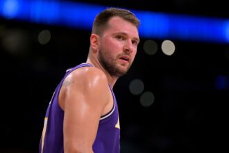 Feb 5, 2026; Los Angeles, California, USA; Los Angeles Lakers guard Luka Doncic (77) looks on in the first half against the Philadelphia 76ers at Crypto.com Arena. Mandatory Credit: Jayne Kamin-Oncea-Imagn Images