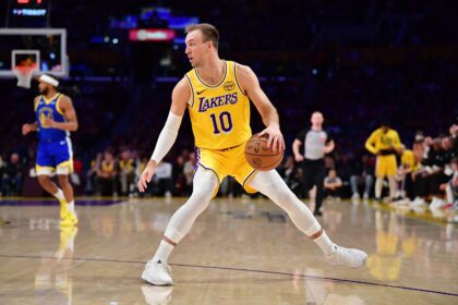 Los Angeles Lakers guard Luke Kennard (10) controls the ball against the Golden State Warriors during the first half at Crypto.com Arena.
