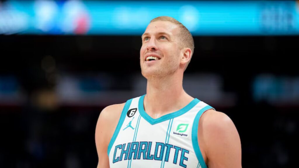 Mason Plumlee looks on during a Hornets game Mandatory Credit: Nic Antaya - Getty Images