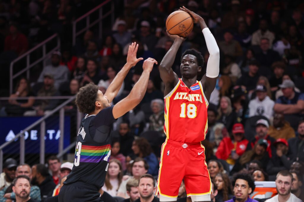 Dec 5, 2025; Atlanta, Georgia, USA; Atlanta Hawks forward Mouhamed Gueye (18) shoots against the Denver Nuggets in the second quarter at State Farm Arena. Mandatory Credit: Brett Davis-Imagn Images