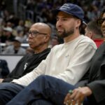 Former NBA player Mychal Thompson and his son Golden State Warriors Klay Thompson attend the game between the Los Angeles Sparks and the Indiana Fever at Crypto.com Arena.