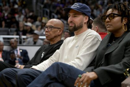 Former NBA player Mychal Thompson and his son Golden State Warriors Klay Thompson attend the game between the Los Angeles Sparks and the Indiana Fever at Crypto.com Arena.