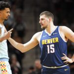 Jan 4, 2025; San Antonio, Texas, USA; San Antonio Spurs center Victor Wembanyama (1) greets Denver Nuggets center Nikola Jokic (15) before a game at Frost Bank Center. Mandatory Credit: Scott Wachter-Imagn Images