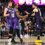 Apr 11, 2025; Sacramento, California, USA; Sacramento Kings forward DeMar DeRozan (10) talks with forward Domantas Sabonis (left) and guard Zach LaVine (8) during the fourth quarter against the Los Angeles Clippers at Golden 1 Center. Mandatory Credit: Darren Yamashita-Imagn Images