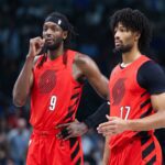 Nov 16, 2025; Dallas, Texas, USA; Portland Trail Blazers forward Jerami Grant (9) and Portland Trail Blazers guard Shaedon Sharpe (17) chat during the second quarter against the Dallas Mavericks at American Airlines Center. Mandatory Credit: Kevin Jairaj-Imagn Images
