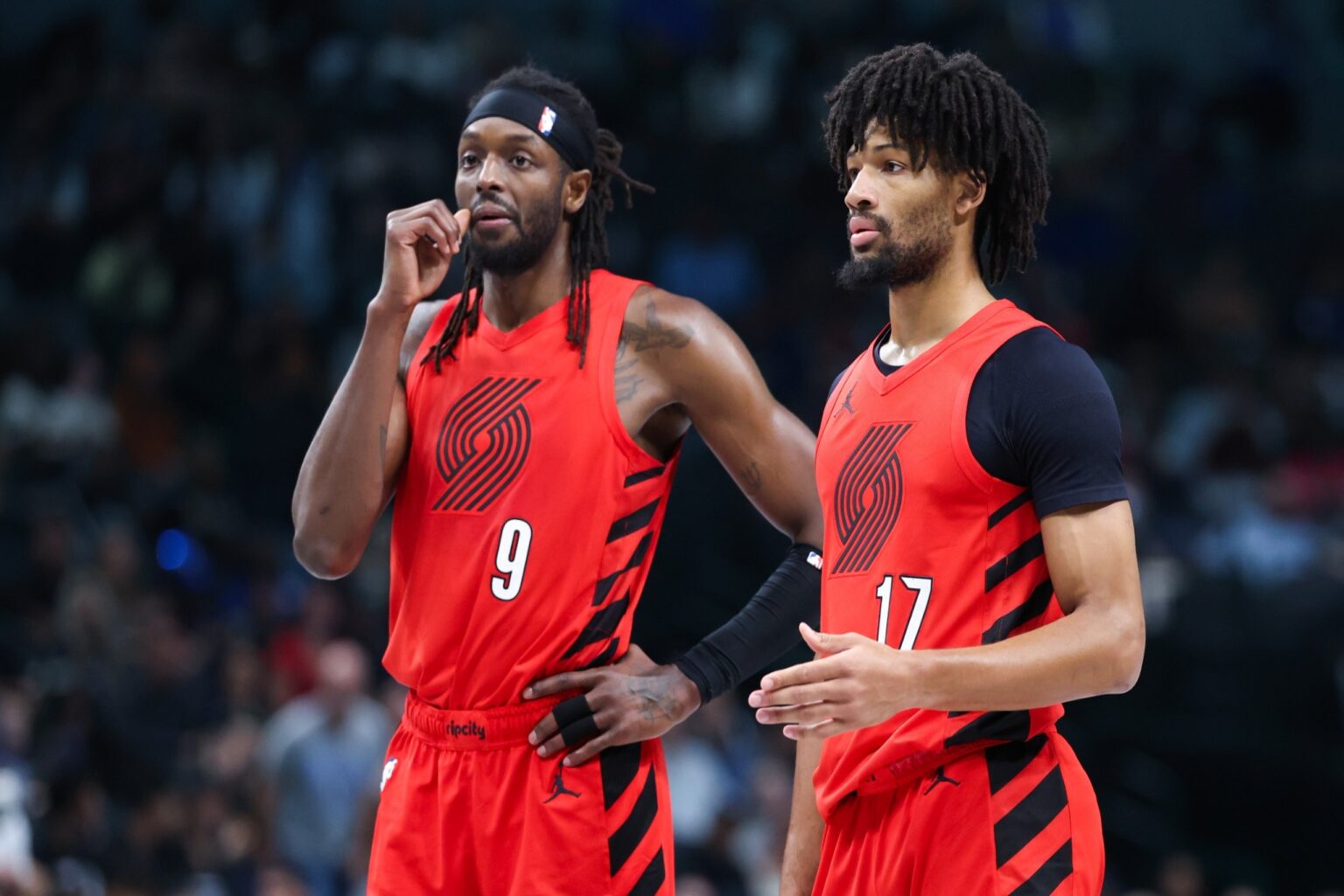 Nov 16, 2025; Dallas, Texas, USA; Portland Trail Blazers forward Jerami Grant (9) and Portland Trail Blazers guard Shaedon Sharpe (17) chat during the second quarter against the Dallas Mavericks at American Airlines Center. Mandatory Credit: Kevin Jairaj-Imagn Images