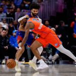 Feb 1, 2026; Denver, Colorado, USA; Oklahoma City Thunder guard Shai Gilgeous-Alexander (2) controls the ball under pressure from Denver Nuggets guard Jamal Murray (27) in the fourth quarter at Ball Arena. Mandatory Credit: Isaiah J. Downing-Imagn Images