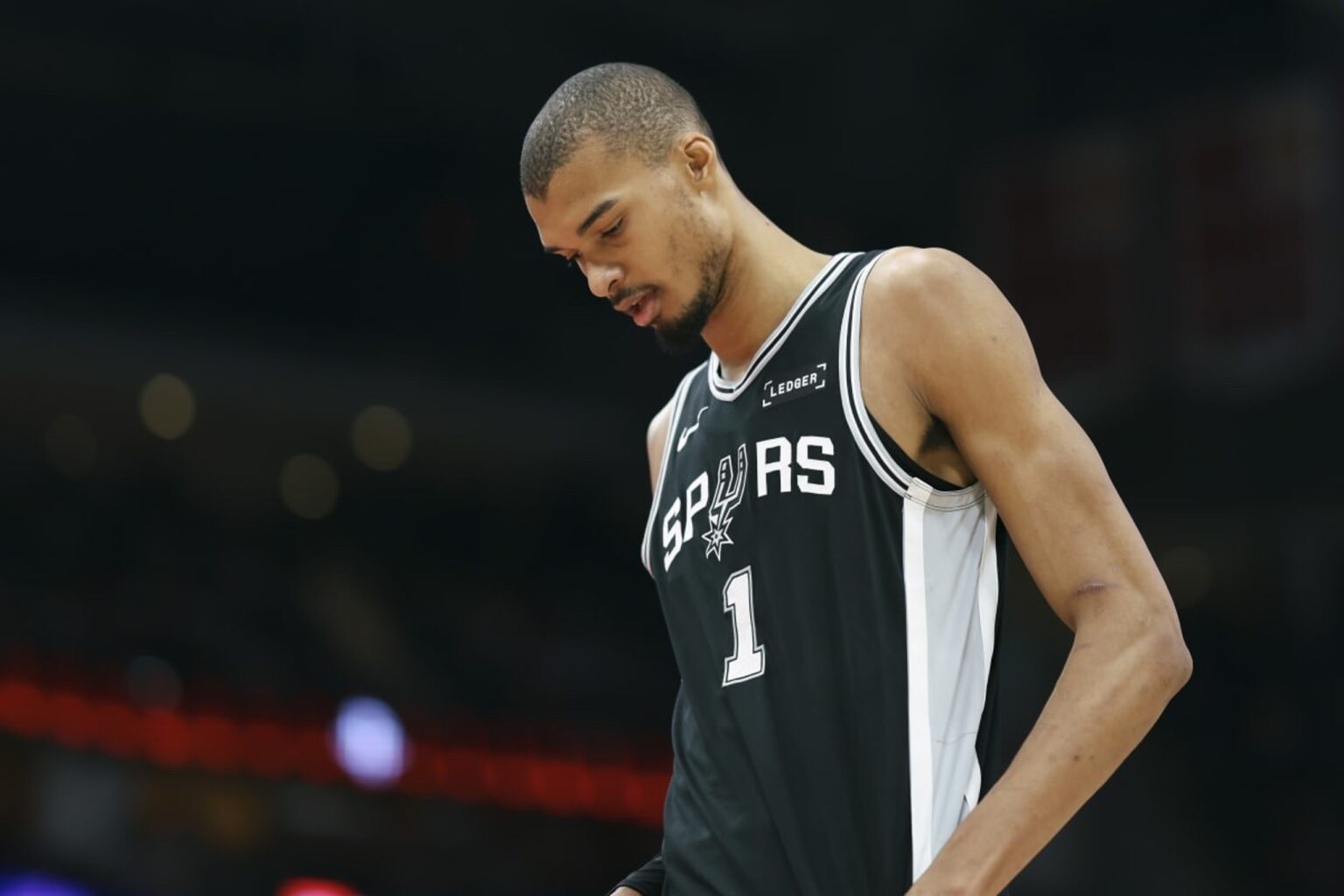 Jan 28, 2026; Houston, Texas, USA; San Antonio Spurs forward Victor Wembanyama (1) walks on the court during the first half against the Houston Rockets at Toyota Center. Mandatory Credit: Troy Taormina-Imagn Images