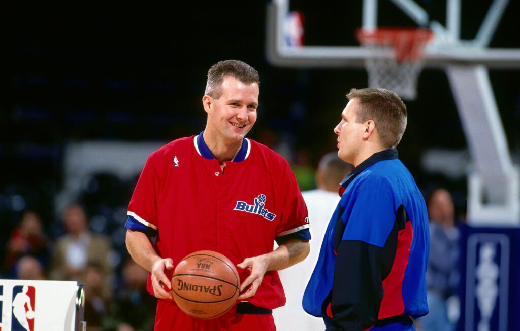 OAKLAND, CA - 1994: Andrew Gaze of the Washington Bullets looks on against the Golden State Warriors during a game in 1994 at The Oakland-Alameda County Coliseum Arena in Oakland, California. NOTE TO USER: User expressly acknowledges and agrees that, by downloading and/or using this Photograph, user is consenting to the terms and conditions of the Getty Images License Agreement. Mandatory Copyright Notice: Copyright 1994 NBAE (Photo by Sam Forencich/NBAE via Getty Images)