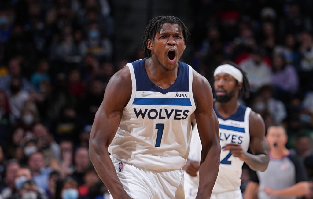 DENVER, CO - DECEMBER 15: Anthony Edwards #1 of the Minnesota Timberwolves celebrates during the game against the Denver Nuggets on December 15, 2021 at the Ball Arena in Denver, Colorado. NOTE TO USER: User expressly acknowledges and agrees that, by downloading and/or using this Photograph, user is consenting to the terms and conditions of the Getty Images License Agreement. Mandatory Copyright Notice: Copyright 2021 NBAE (Photo by Bart Young/NBAE via Getty Images)