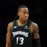 MINNEAPOLIS, MINNESOTA - FEBRUARY 09: Ayo Dosunmu #13 of the Minnesota Timberwolves looks on against the Atlanta Hawks in the first quarter at Target Center on February 09, 2026 in Minneapolis, Minnesota. (Photo by David Berding/Getty Images)