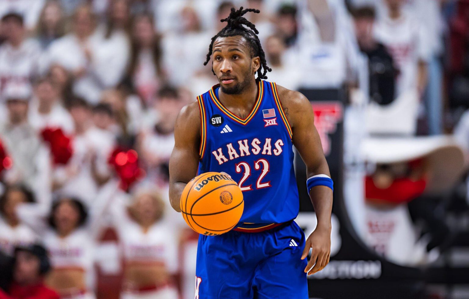 LUBBOCK, TEXAS - FEBRUARY 02: Darryn Peterson #22 of the Kansas Jayhawks handles the ball during the first half of the game against the Texas Tech Red Raiders at United Supermarkets Arena on February 02, 2026 in Lubbock, Texas. (Photo by John E. Moore III/Getty Images)
