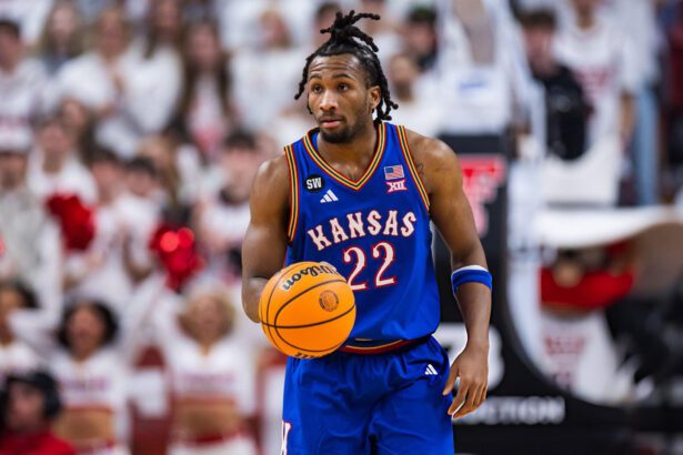 LUBBOCK, TEXAS - FEBRUARY 02: Darryn Peterson #22 of the Kansas Jayhawks handles the ball during the first half of the game against the Texas Tech Red Raiders at United Supermarkets Arena on February 02, 2026 in Lubbock, Texas. (Photo by John E. Moore III/Getty Images)