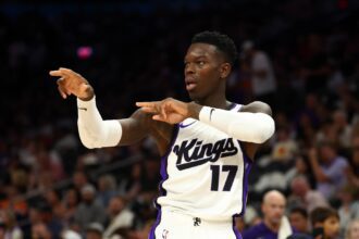 Phoenix, Arizona, USA; Sacramento Kings guard Dennis Schroder (17) reacts against the Phoenix Suns at the Mortgage Matchup Center. Mandatory Credit: Mark J. Rebilas-Imagn Images