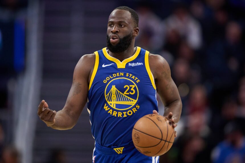 San Francisco, California, USA; Golden State Warriors forward Draymond Green (23) brings the ball up court against the Milwaukee Bucks during the third quarter at Chase Center. Mandatory Credit: Robert Edwards-Imagn Images