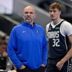 Dallas, Texas, USA; Dallas Mavericks head coach Jason Kidd and forward Cooper Flagg (32) look on during the second quarter against the LA Clippers in an NBA Cup game at the American Airlines Center. Mandatory Credit: Jerome Miron-Imagn Images