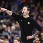 Chicago, Illinois, USA; Los Angeles Lakers head coach JJ Redick directs his team against the Chicago Bulls during the first half at United Center. Mandatory Credit: Kamil Krzaczynski-Imagn Images