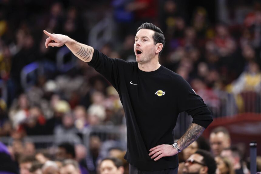 Chicago, Illinois, USA; Los Angeles Lakers head coach JJ Redick directs his team against the Chicago Bulls during the first half at United Center. Mandatory Credit: Kamil Krzaczynski-Imagn Images