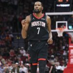 Houston, Texas, USA; Houston Rockets forward Kevin Durant (7) reacts after a play during the third quarter against the Cleveland Cavaliers at Toyota Center. Mandatory Credit: Troy Taormina-Imagn Images