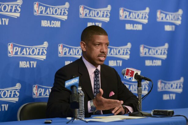 Oakland, CA, USA; Players association advisor Kevin Johnson addresses the media during halftime in game four of the first round of the 2014 NBA Playoffs between the Los Angeles Clippers and the Golden State Warriors at Oracle Arena. Mandatory Credit: Kyle Terada-Imagn Images
