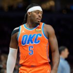 Minneapolis, Minnesota, USA; Oklahoma City Thunder guard Luguentz Dort (5) during a break in the action against the Minnesota Timberwolves in the third quarter at Target Center. Mandatory Credit: Matt Blewett-Imagn Images