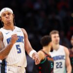 WASHINGTON, DC - DECEMBER 26: Paolo Banchero #5 of the Orlando Magic celebrates after a play against the Washington Wizards during the second half at Capital One Arena on December 26, 2023 in Washington, DC. NOTE TO USER: User expressly acknowledges and agrees that, by downloading and or using this photograph, User is consenting to the terms and conditions of the Getty Images License Agreement. (Photo by Scott Taetsch/Getty Images)