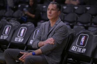 Los Angeles, California, USA; Rob Pelinka, Vice President of Operations watches players warm up prior to the game against the Phoenix Suns at Crypto.com Arena. Mandatory Credit: Jayne Kamin-Oncea-Imagn Images