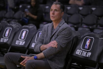 Los Angeles, California, USA; Rob Pelinka, Vice President of Operations watches players warm up prior to the game against the Phoenix Suns at Crypto.com Arena. Mandatory Credit: Jayne Kamin-Oncea-Imagn Images