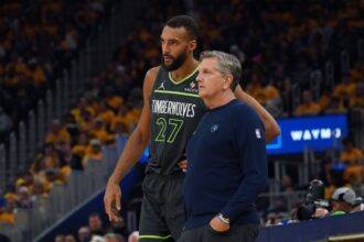San Francisco, California, USA; Minnesota Timberwolves center Rudy Gobert (27) talks with Minnesota Timberwolves head coach Chris Finch in the second quarter against the Golden State Warriors during Game 3 in the second round of the 2025 NBA Playoffs at Chase Center. Mandatory Credit: David Gonzales-Imagn Images