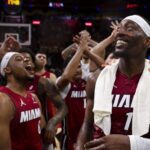 Miami Heat center Bam Adebayo (13) celebrates with teammates after scoring 83 points against the Washington Wizards, the second-highest single-game total in NBA history, Tuesday, March 10, 2026, at Kaseya Center in Miami. The Heat won 150-129. Alie Skowronski askowronski@miamiherald.com