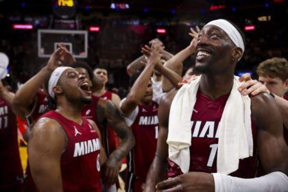 Miami Heat center Bam Adebayo (13) celebrates with teammates after scoring 83 points against the Washington Wizards, the second-highest single-game total in NBA history, Tuesday, March 10, 2026, at Kaseya Center in Miami. The Heat won 150-129. Alie Skowronski askowronski@miamiherald.com